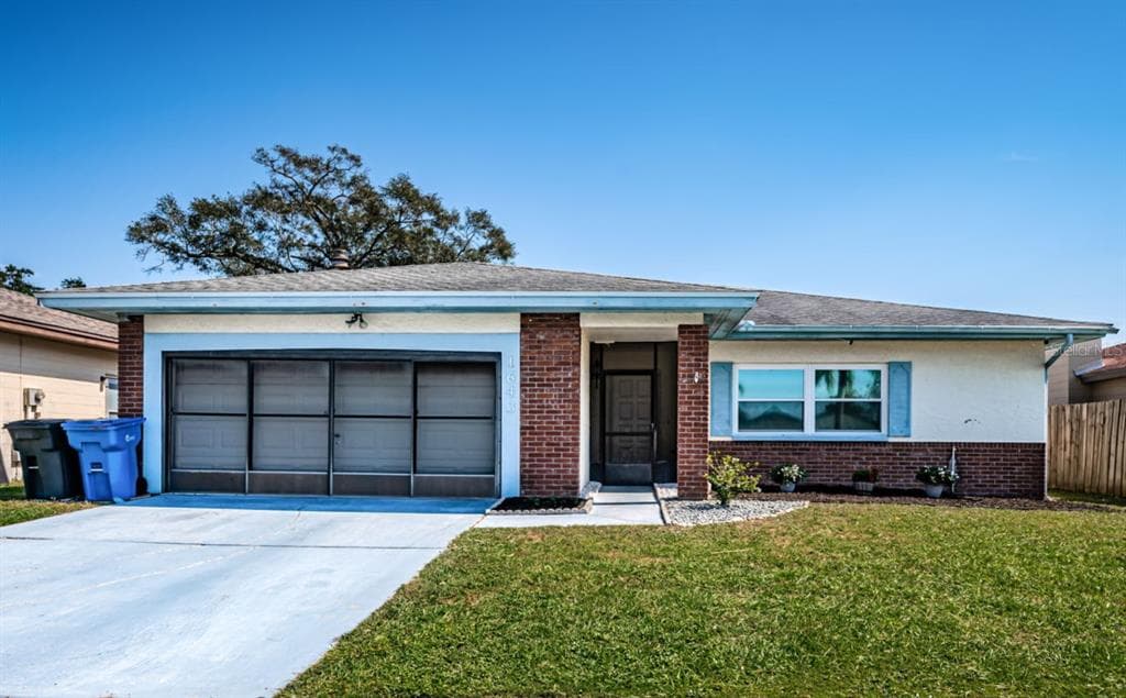 1643 E GROVEHILL ROAD PALM HARBOR, FL 34683