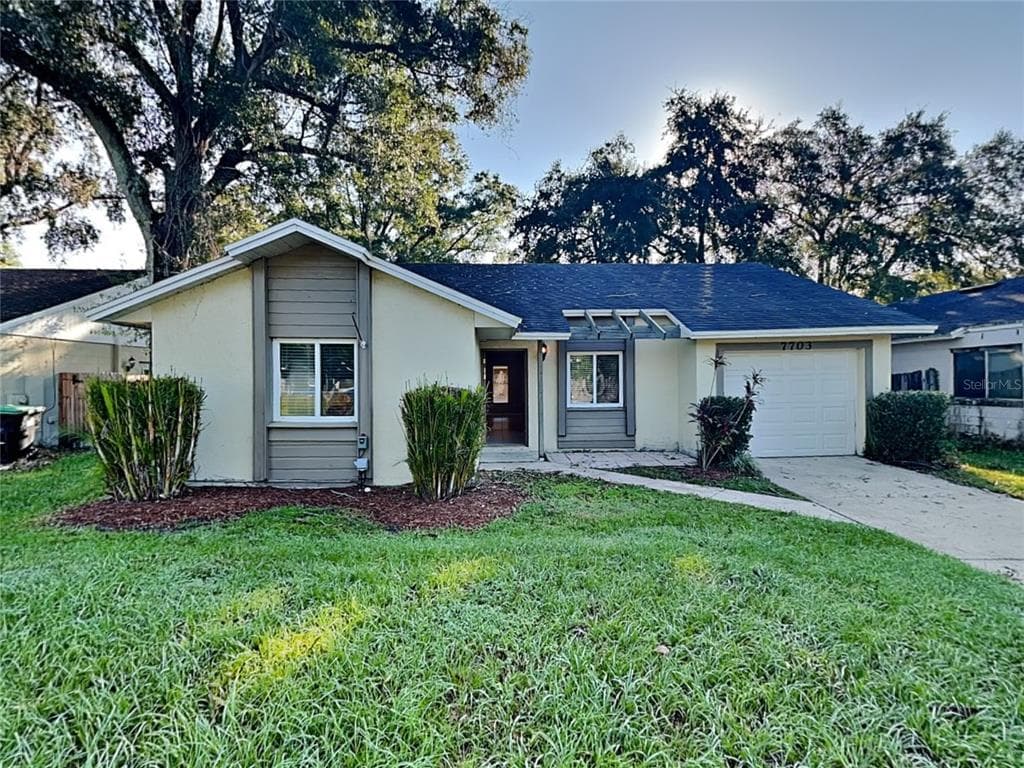 7703 LAKESIDE WOODS DRIVE ORLANDO, FL 32810