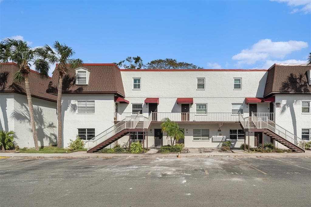 9105 TUDOR DRIVE UNIT F202 TAMPA, FL 33615
