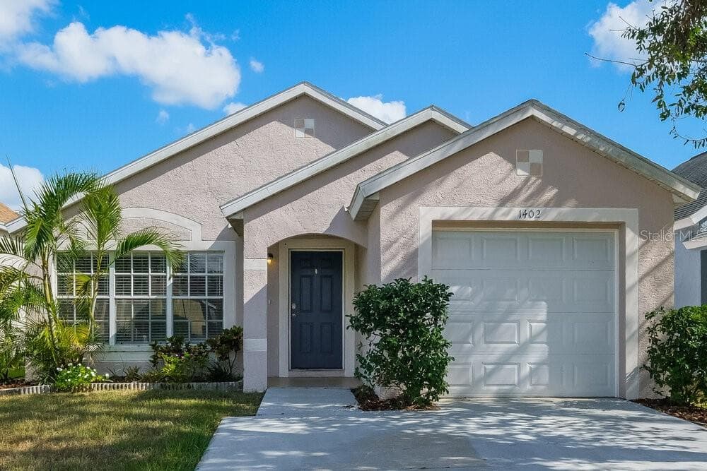 1402 DEW BLOOM ROAD VALRICO, FL 33594