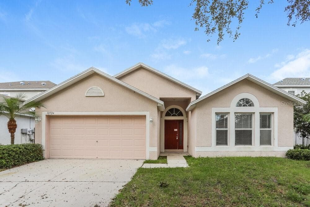 12724 KINGS LAKE DRIVE GIBSONTON, FL 33534