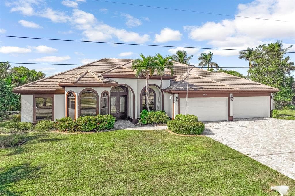 2410 ACADEMY BOULEVARD CAPE CORAL, FL 33990