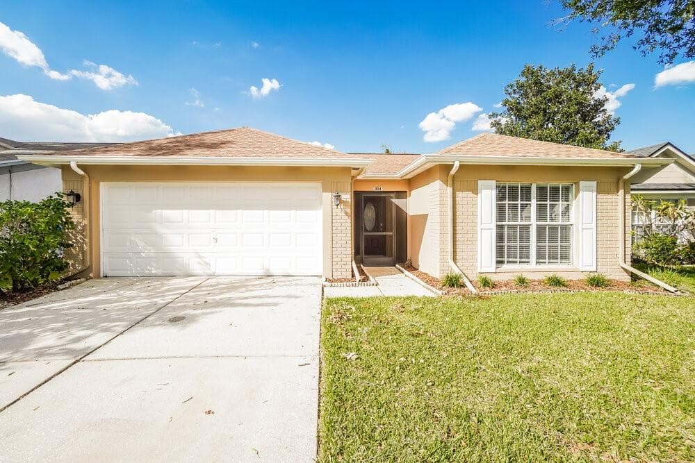 1014 BLOOM HILL AVENUE VALRICO, FL 33596