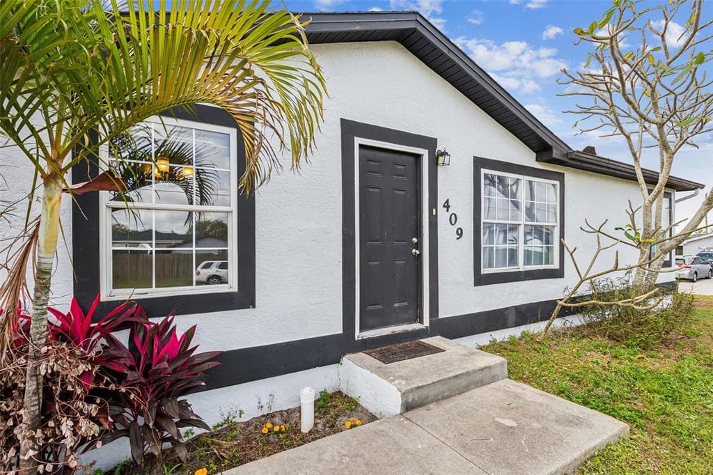 409 HARRY AVENUE N LEHIGH ACRES, FL 33971