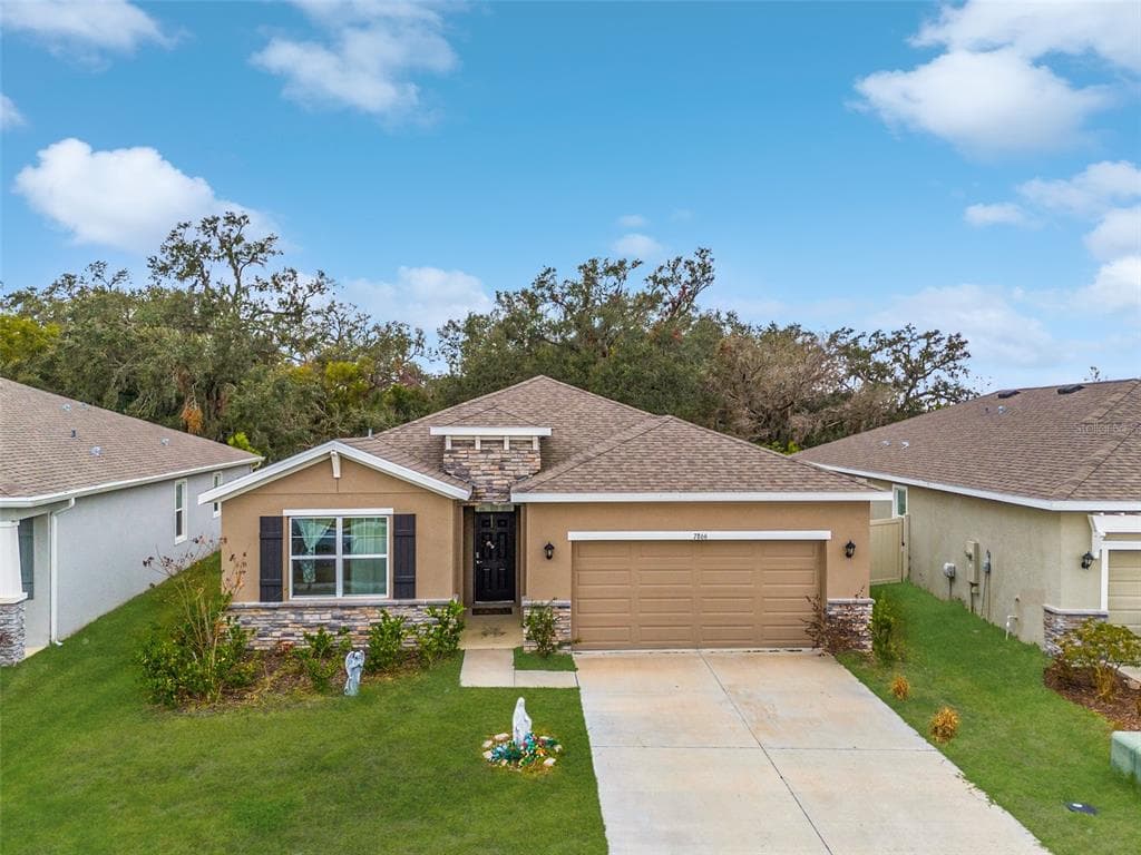 7866 WHEAT STONE DRIVE ZEPHYRHILLS, FL 33540