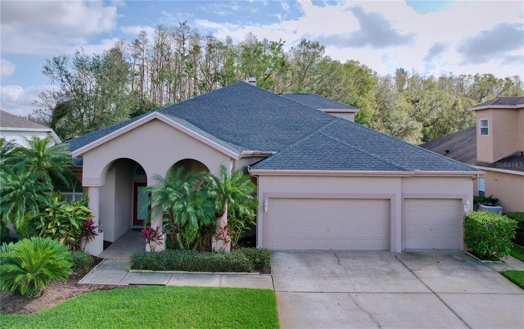 1542 DEERBOURNE DRIVE WESLEY CHAPEL, FL 33543
