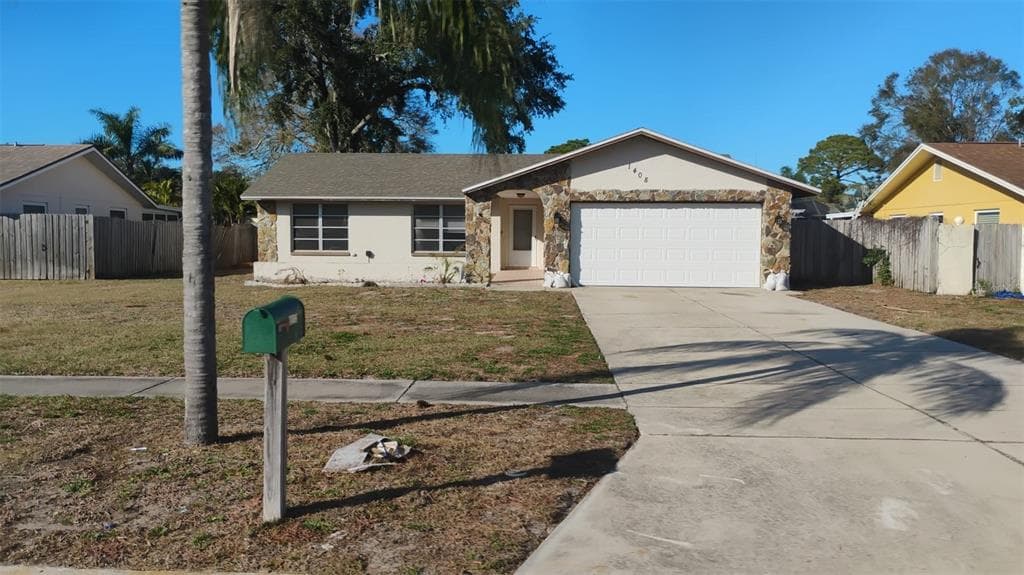 1408 OLEANDER DRIVE TARPON SPRINGS, FL 34689