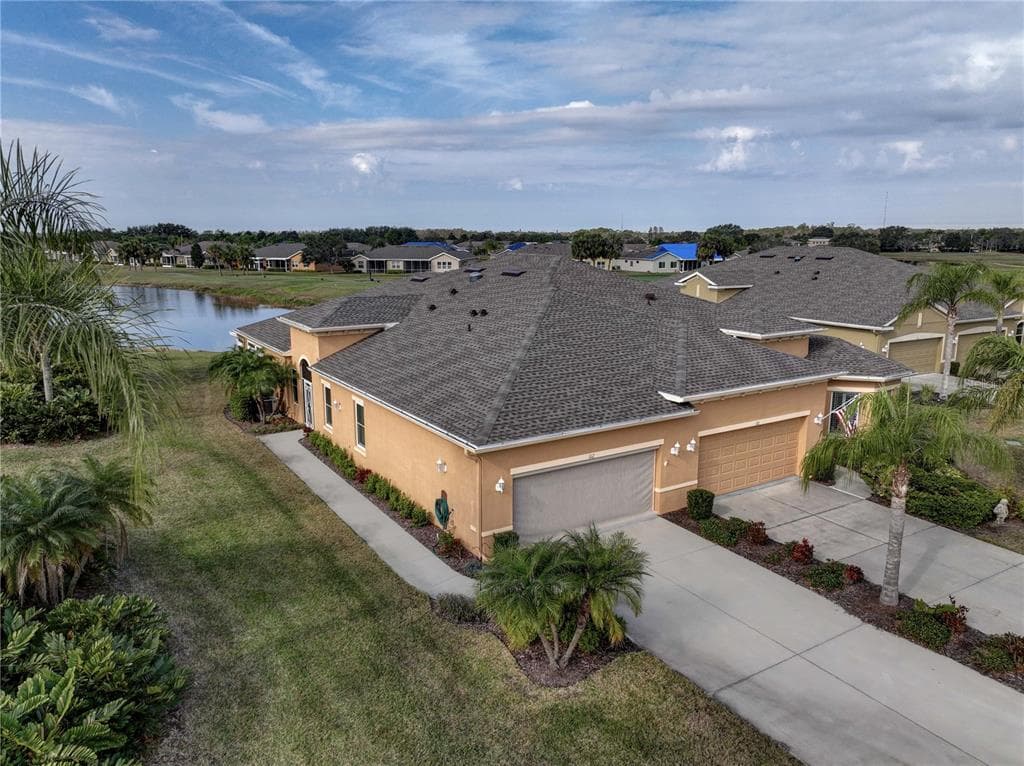 1112 WELLINGTON GREENS CIRCLE SUN CITY CENTER, FL 33573