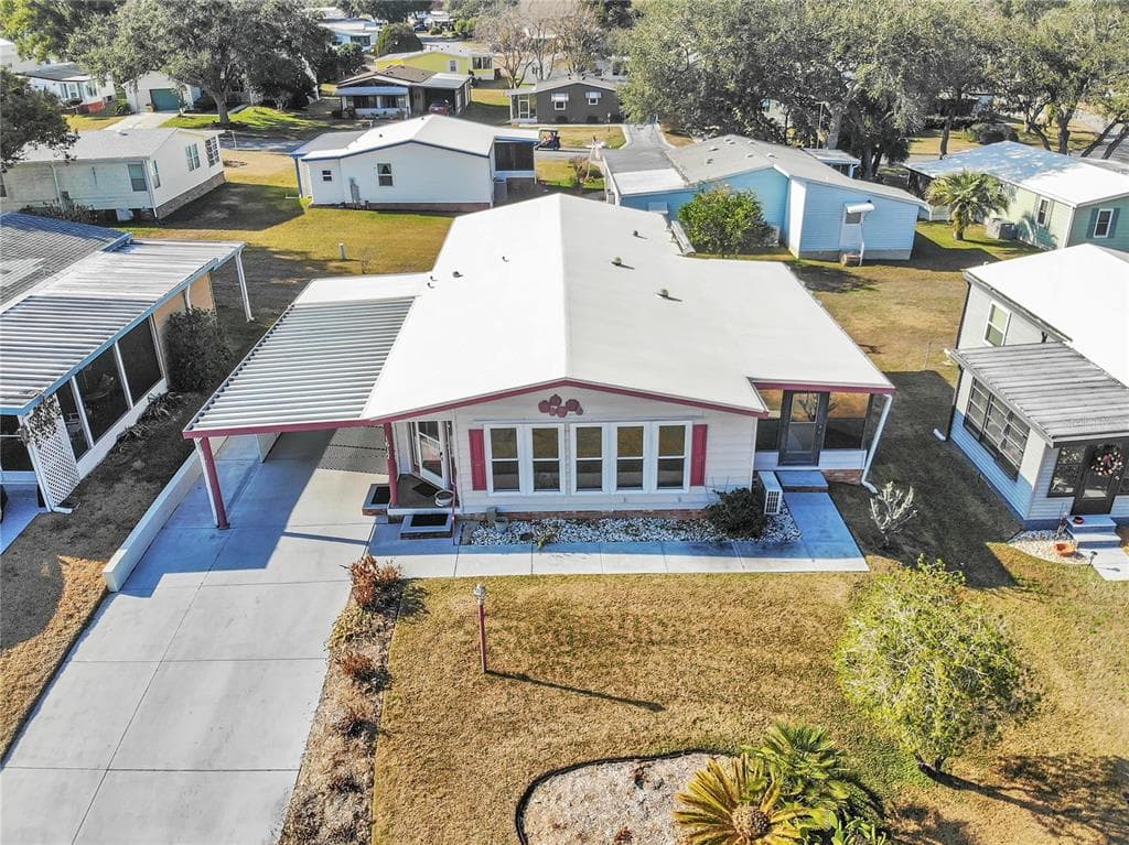 1612 COG HILL DRIVE LADY LAKE, FL 32159