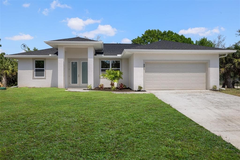 881 SPAULDING STREET E LEHIGH ACRES, FL 33974