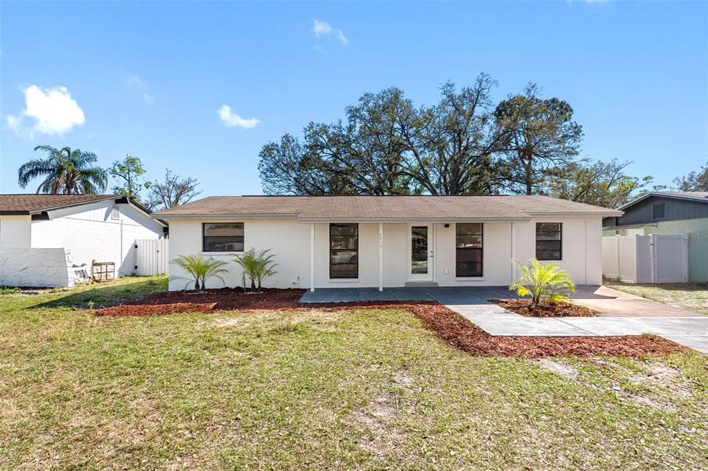 6514 RUNNINGWOODS DRIVE