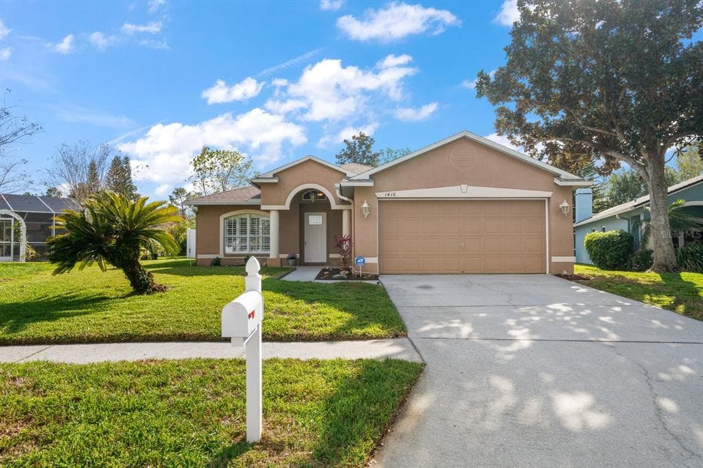 1416 WATERMILL CIRCLE TARPON SPRINGS, FL 34689