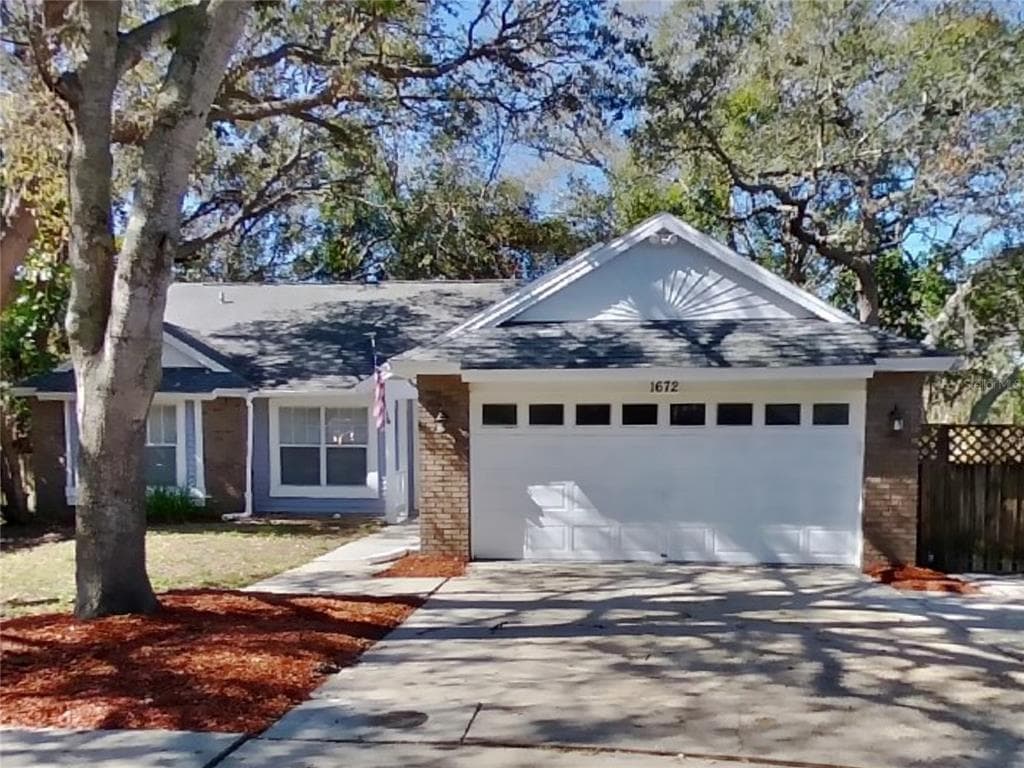 1672 COUNTRYWOOD STREET TARPON SPRINGS, FL 34689
