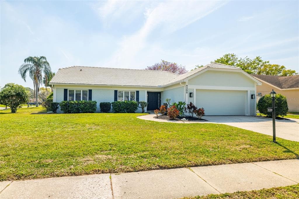 9209 PEBBLE CREEK DRIVE TAMPA, FL 33647