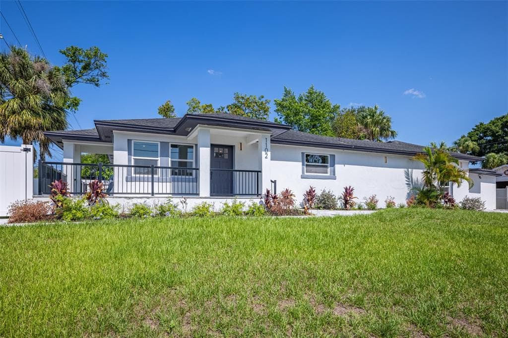 1102 N ALBANY AVENUE TAMPA, FL 33607