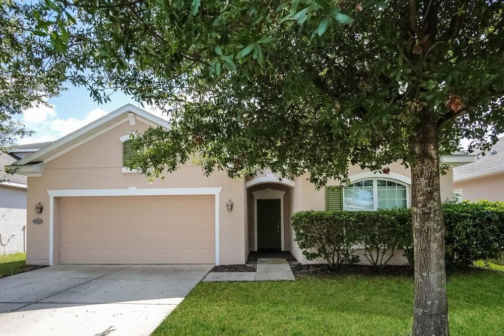 7935 CAMDEN WOODS DRIVE TAMPA, FL 33619