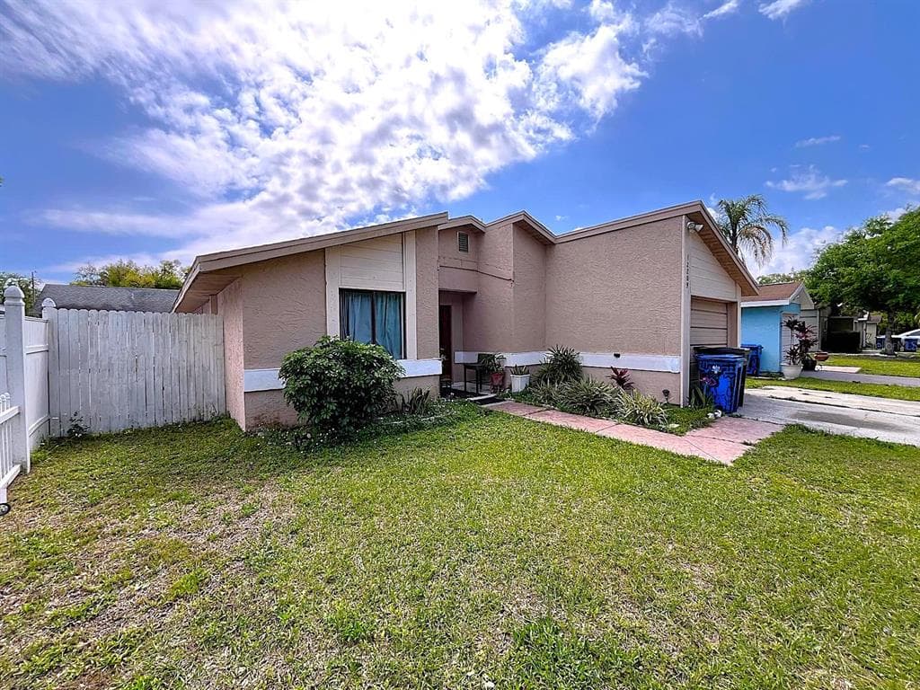 12209 HIDDEN BROOK DRIVE