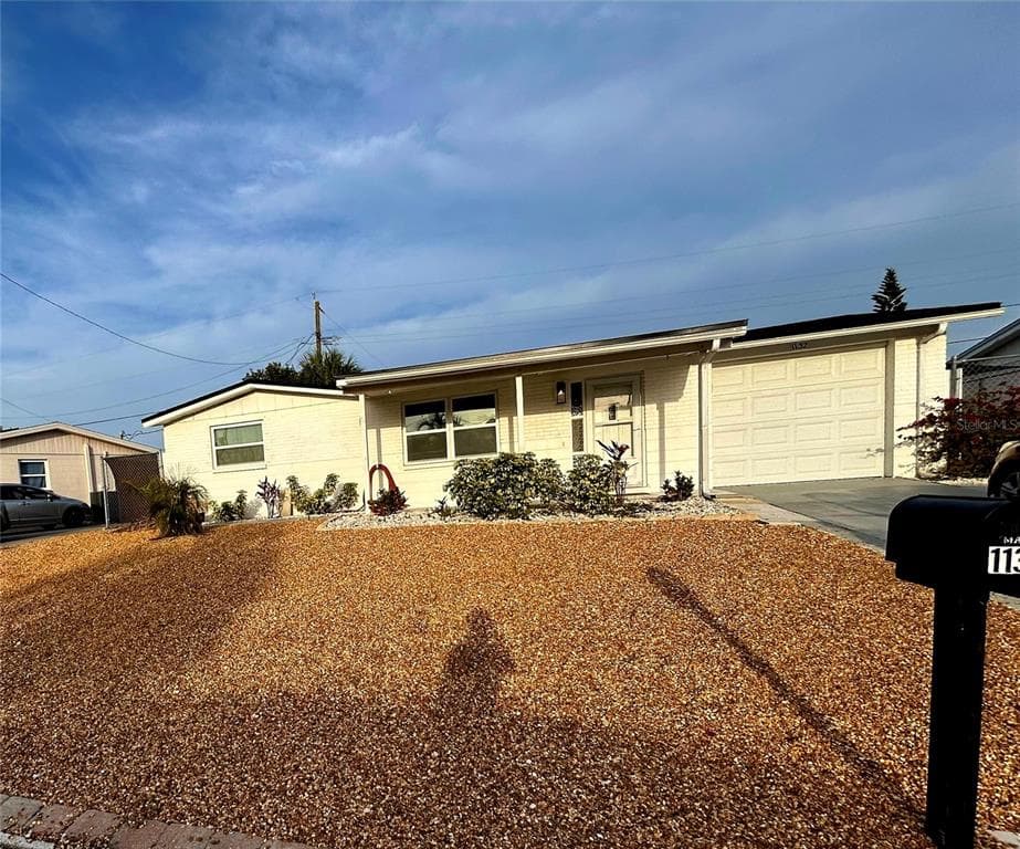 1132 CLAIRBORNE STREET HOLIDAY, FL 34690