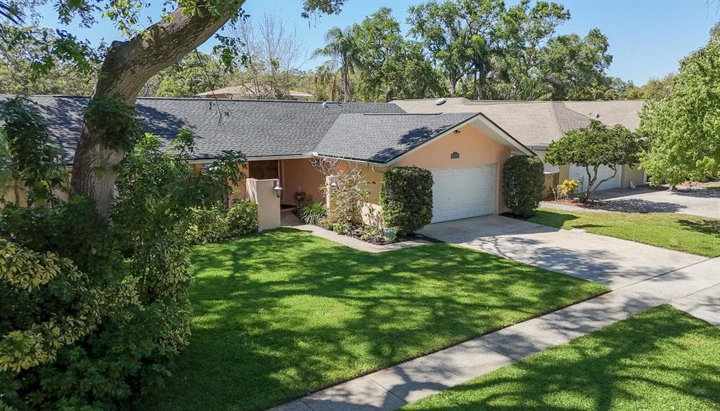 1876 OAK FOREST DRIVE E CLEARWATER, FL 33759