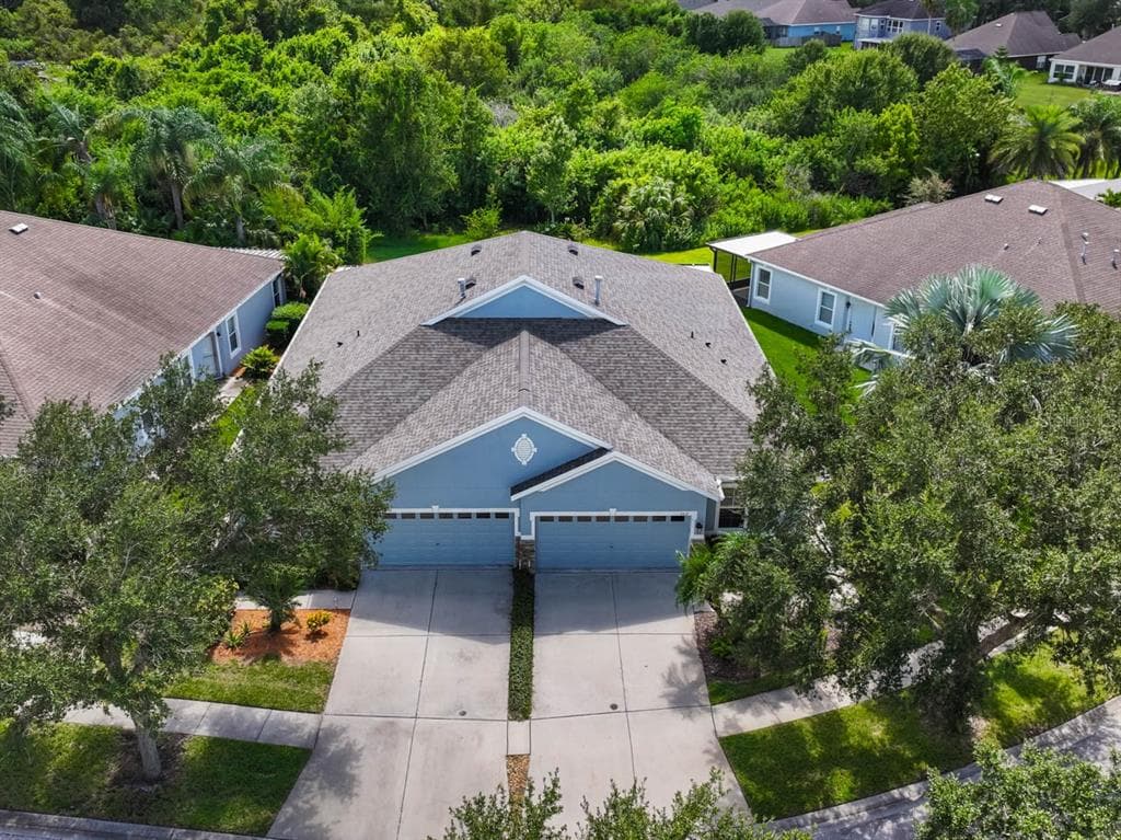 7413 SURREY WOOD LANE APOLLO BEACH, FL 33572