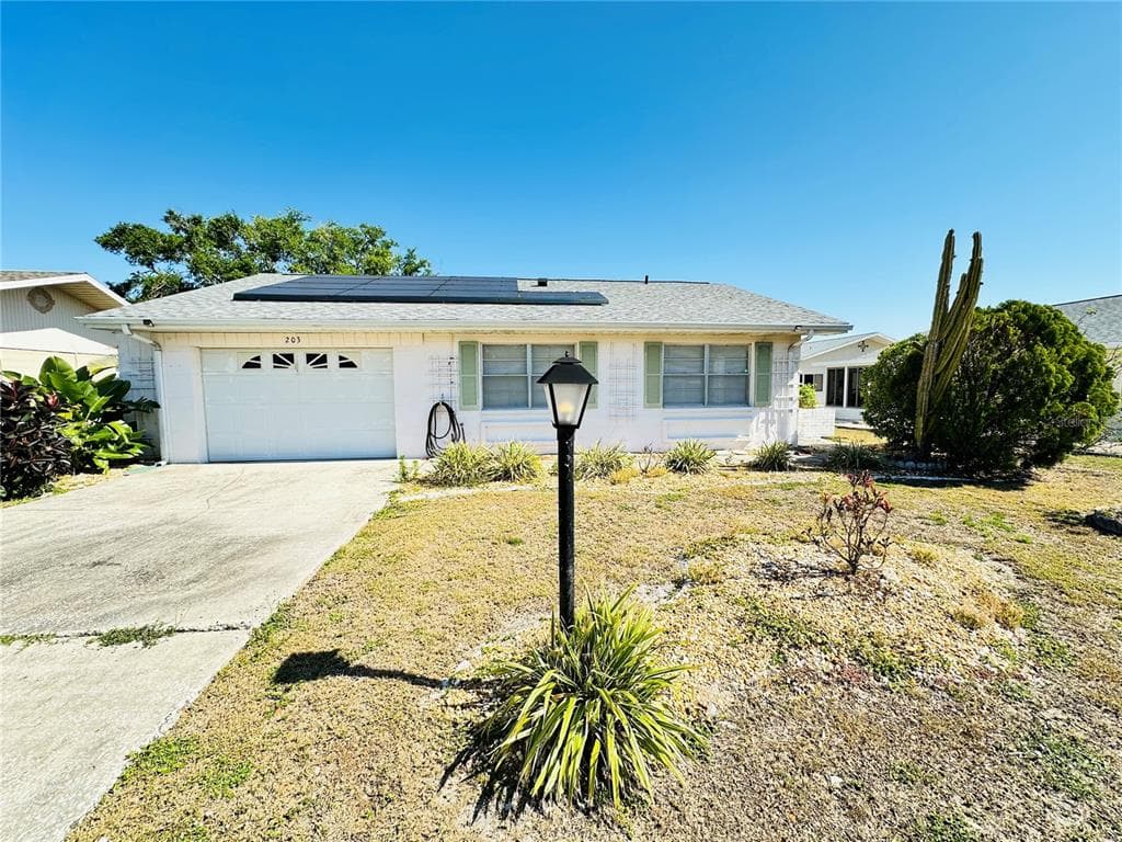 203 RICKENBACKER DRIVE SUN CITY CENTER, FL 33573