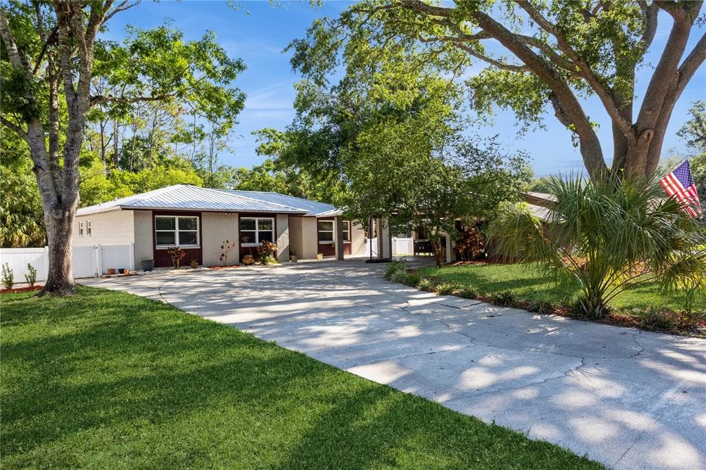 1212 WILDROSE DRIVE LUTZ, FL 33549