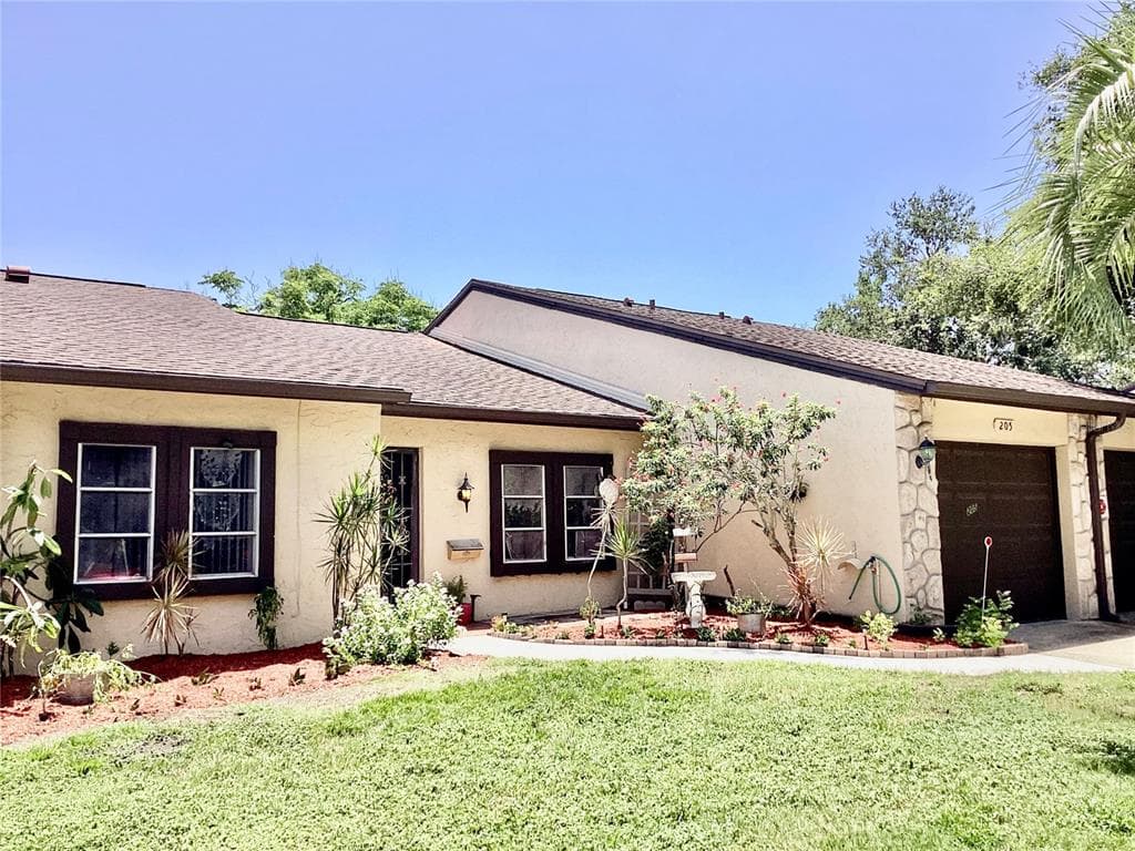 2101 SUNSET POINT ROAD UNIT 205 CLEARWATER, FL 33765