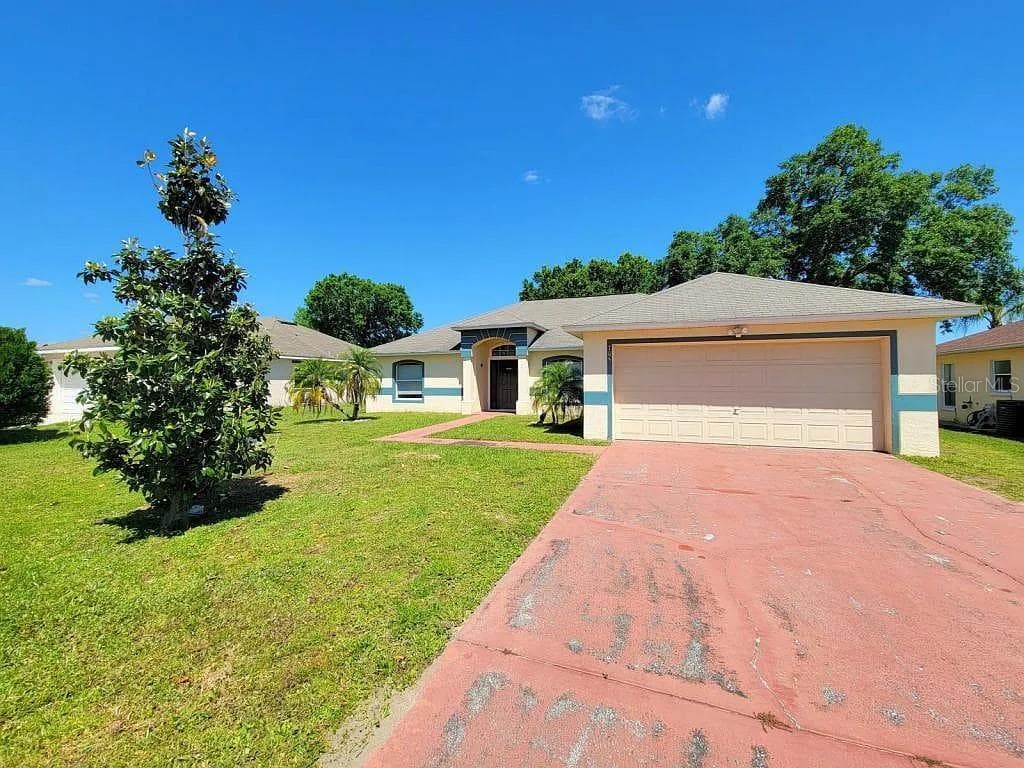 705 FISHER DRIVE POINCIANA, FL 34759