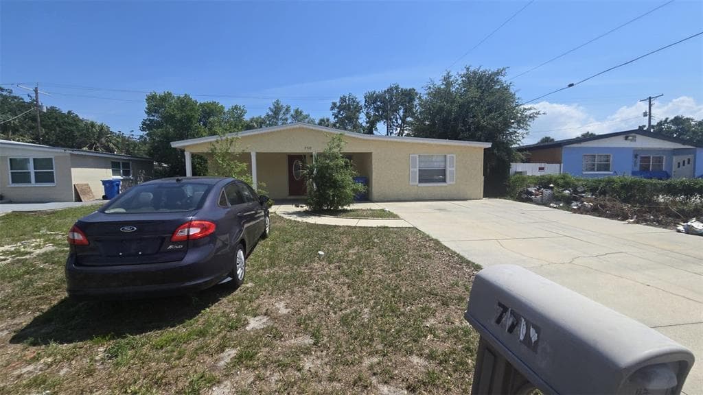 7710 BROOKSIDE LANE TAMPA, FL 33615