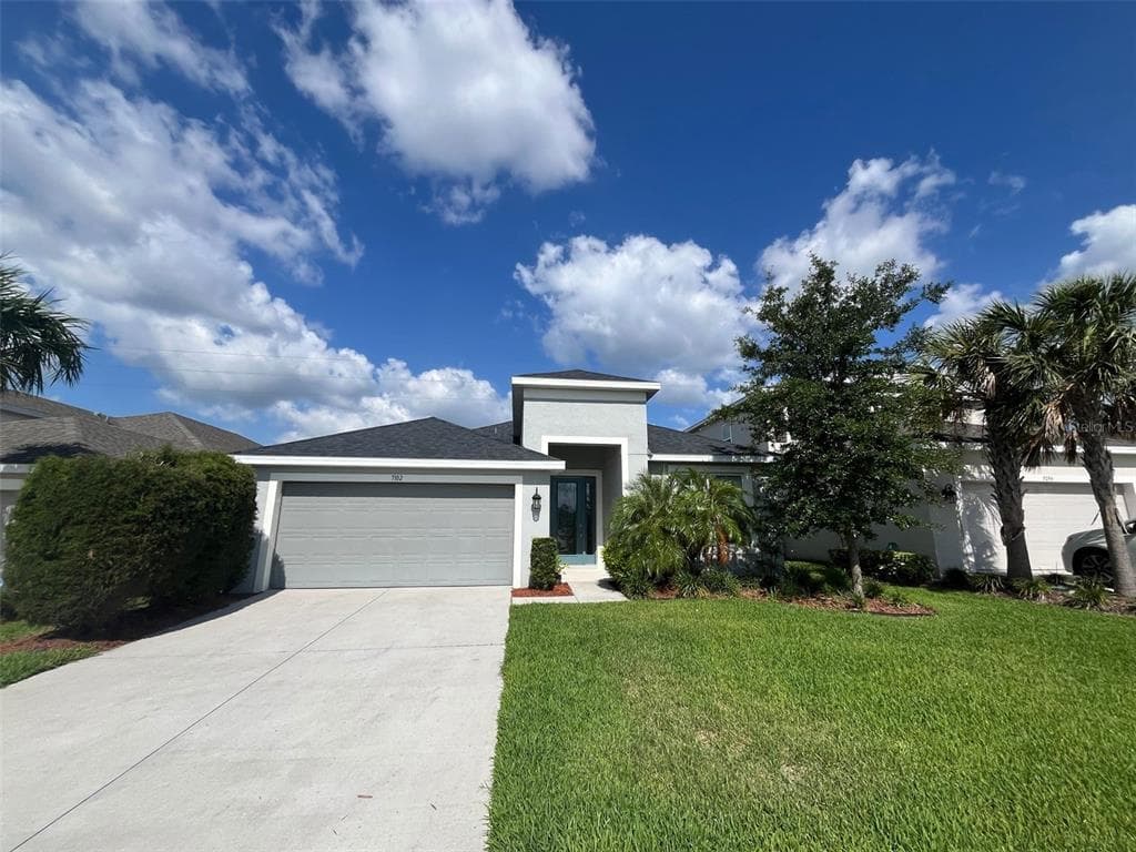 7102 WESLEY PALM WAY WESLEY CHAPEL, FL 33545