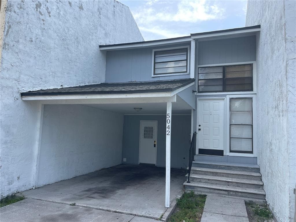 5042 TERRACE VILLAGE LANE TAMPA, FL 33617