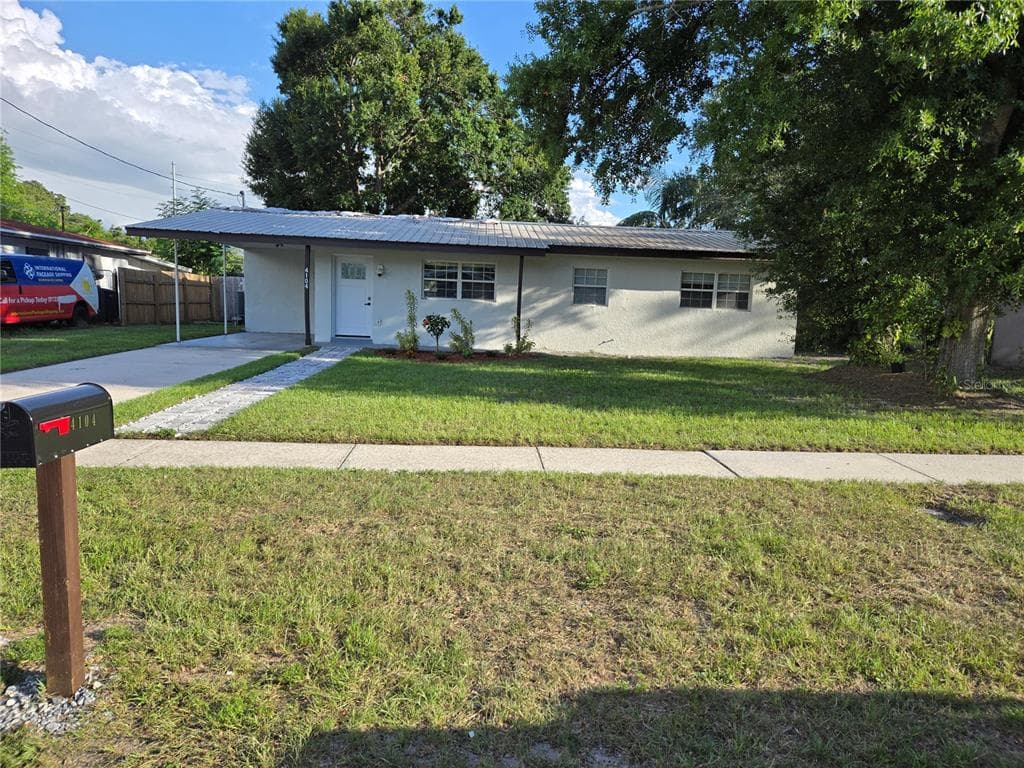 4104 W WISCONSIN AVENUE TAMPA, FL 33616