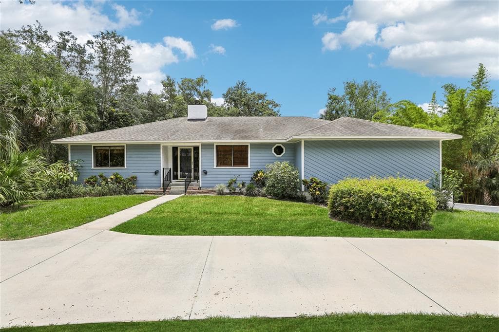 5836 SPRUCE CREEK WOODS DRIVE PORT ORANGE, FL 32127