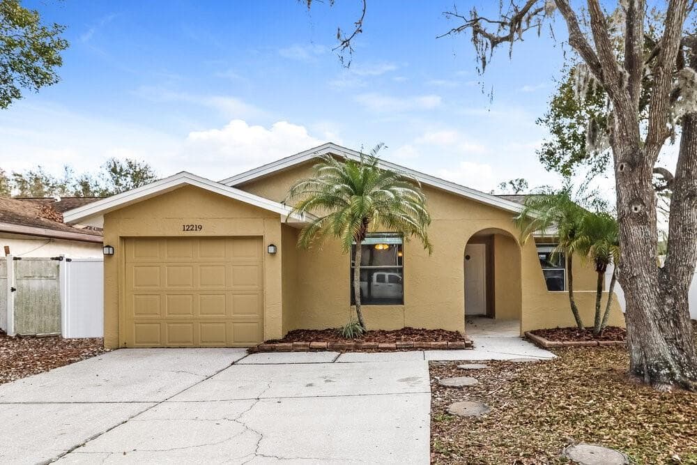 12219 HIDDEN BROOK DRIVE TAMPA, FL 33624
