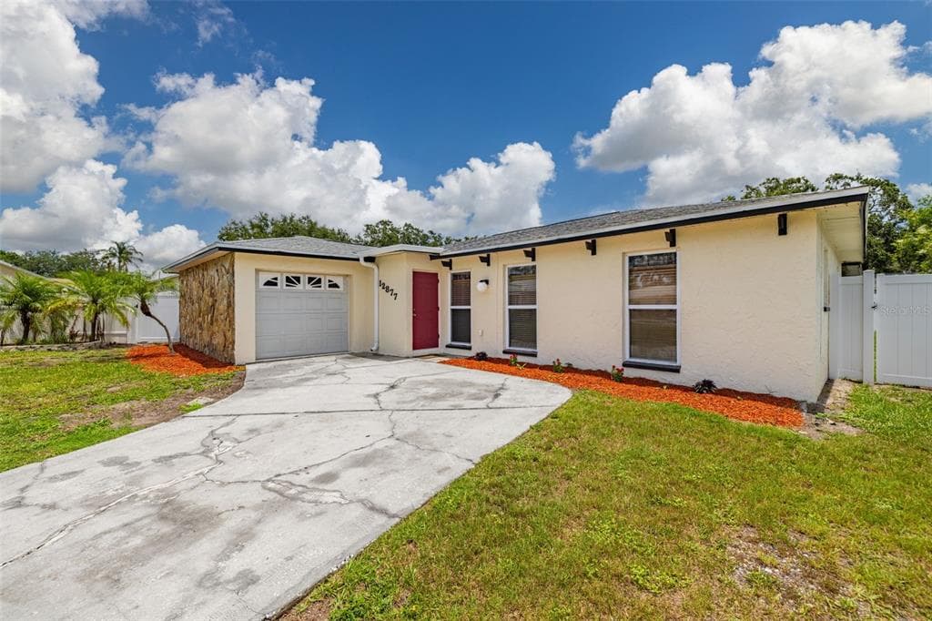 12877 PALM DRIVE LARGO, FL 33774