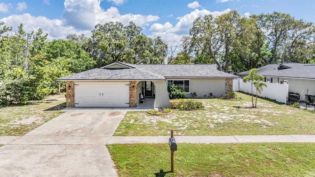1403 TALLAHASSEE DRIVE TARPON SPRINGS, FL 34689
