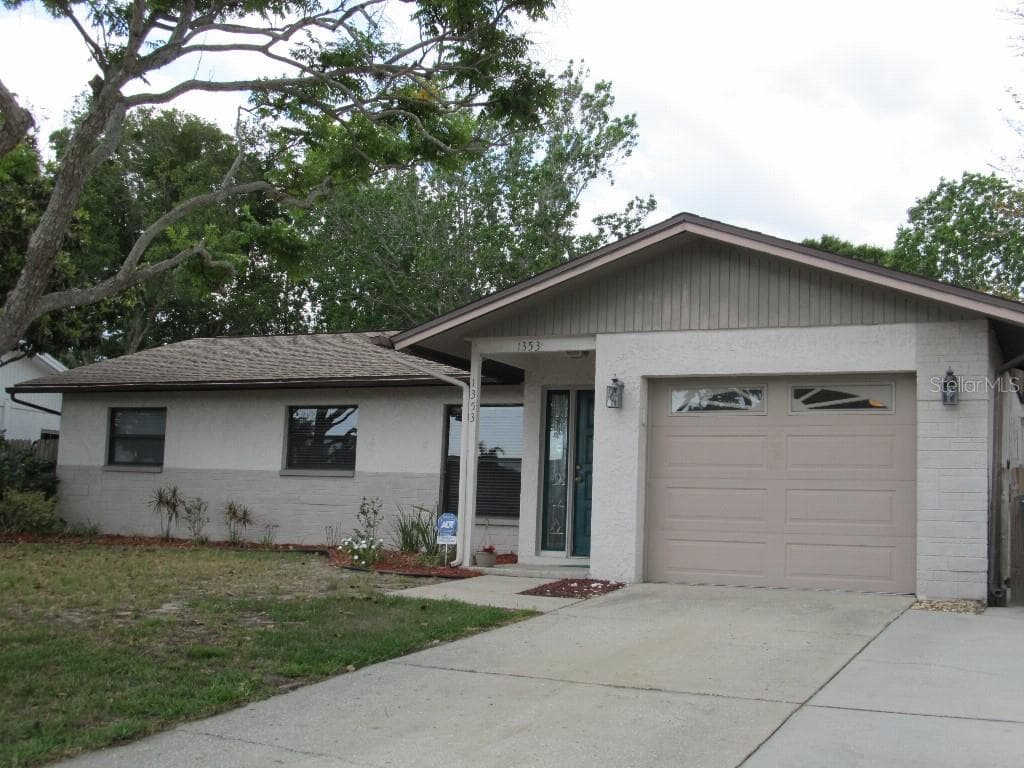 1353 WILDWOOD COURT DUNEDIN, FL 34698