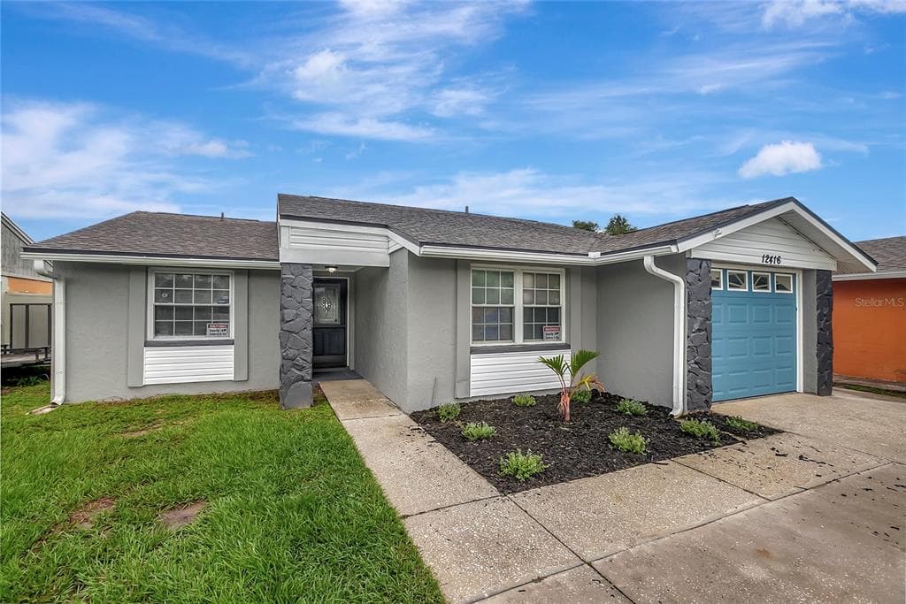 12416 MONDRAGON DRIVE TAMPA, FL 33625