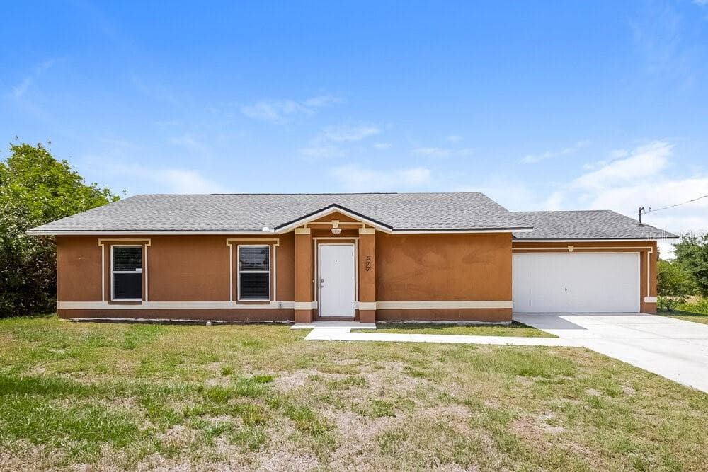 577 PIERRE CIRCLE LEHIGH ACRES, FL 33974