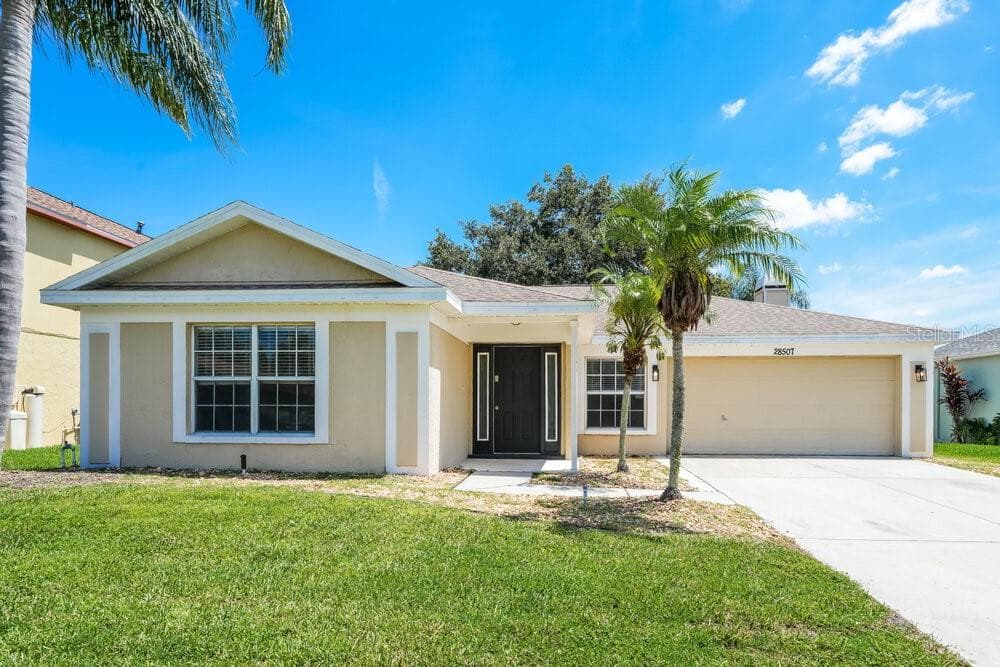 28507 TALL GRASS DRIVE WESLEY CHAPEL, FL 33543