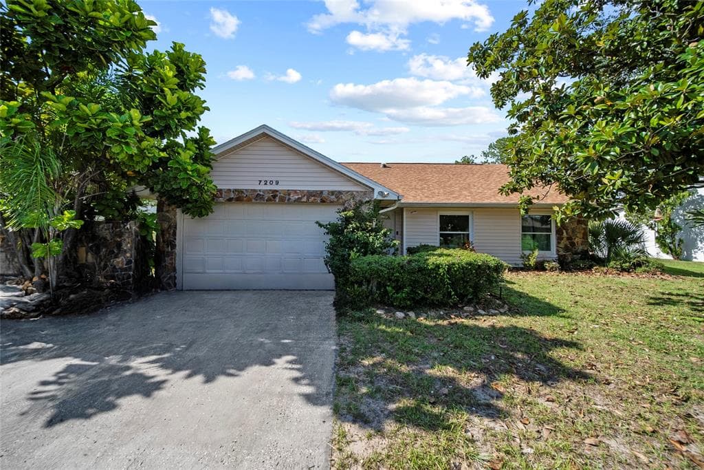 7209 WOODBROOK DRIVE TAMPA, FL 33625