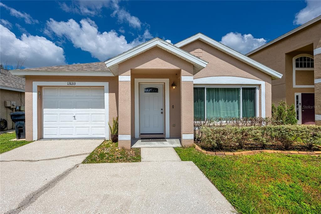 13133 CARROLLWOOD CREEK DRIVE TAMPA, FL 33624