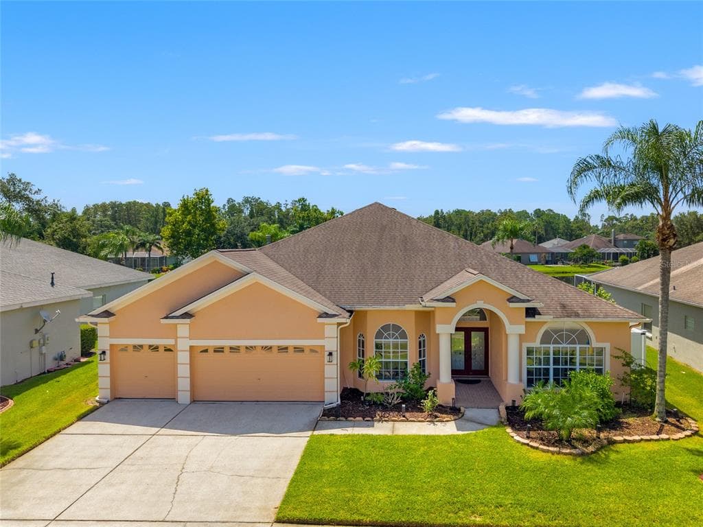 1406 DEERBOURNE DRIVE WESLEY CHAPEL, FL 33543