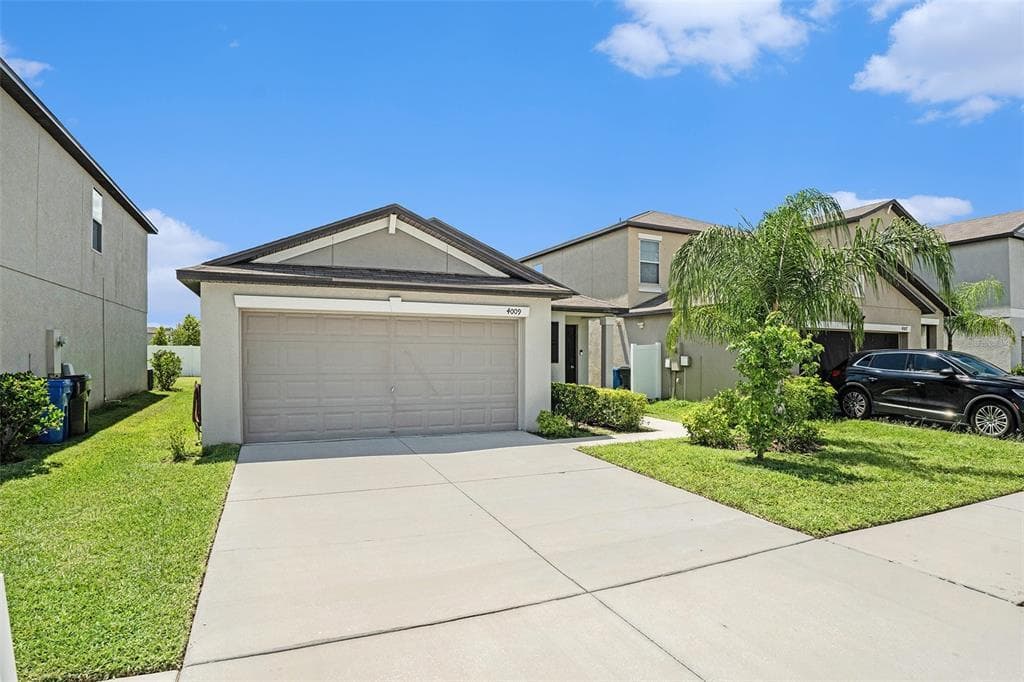 4009 GLOBE THISTLE DRIVE TAMPA, FL 33619