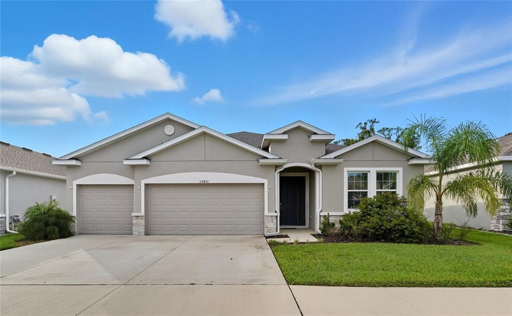 13811 WHISKEY DAISY DRIVE DADE CITY, FL 33525