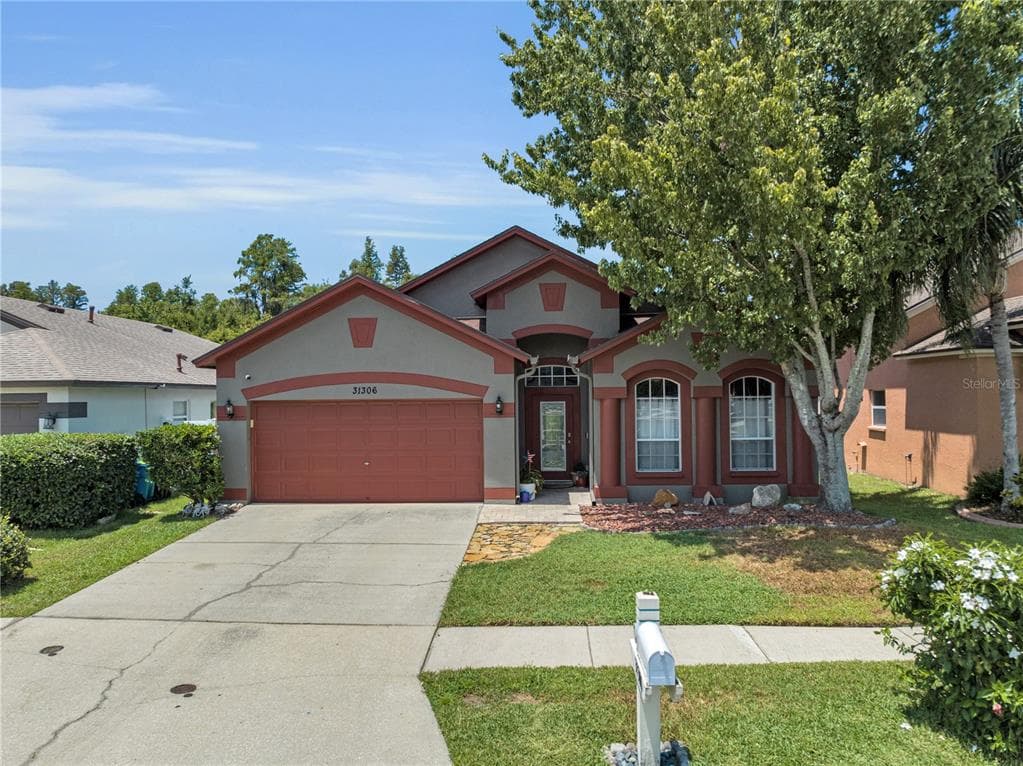 31306 HEATHERSTONE DRIVE WESLEY CHAPEL, FL 33543