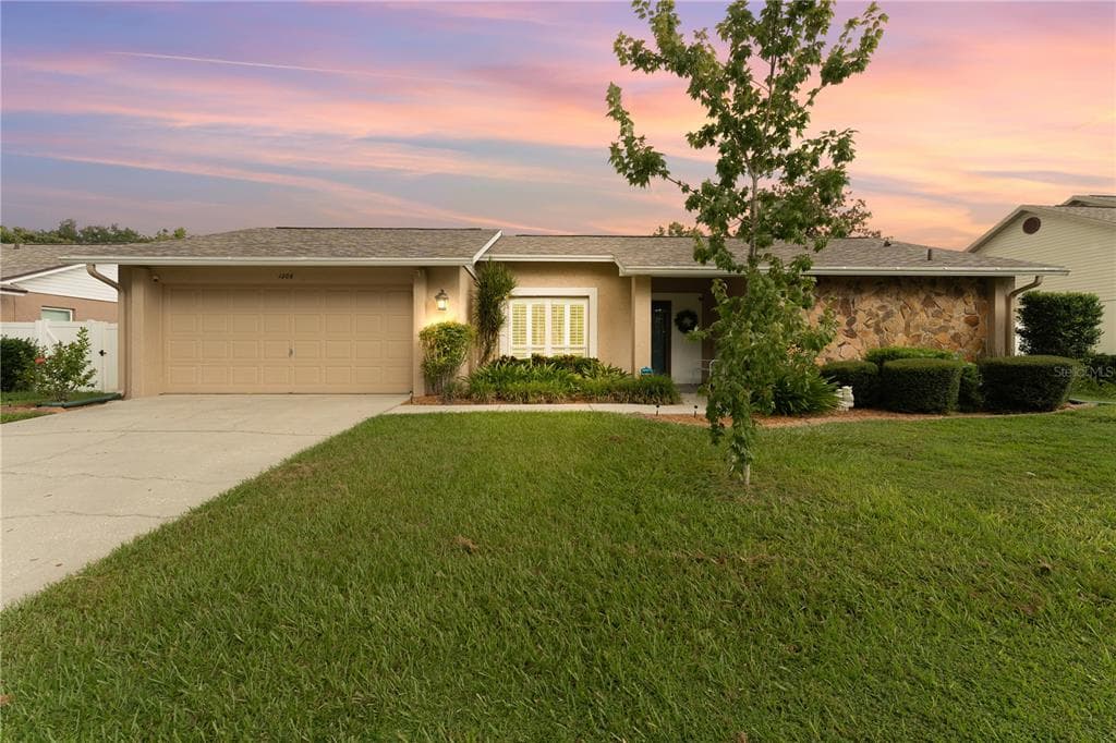 1206 CARRIE WOOD DRIVE VALRICO, FL 33596