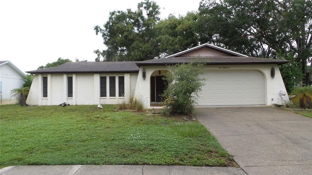 1286 GOLDEN OAK DRIVE TARPON SPRINGS, FL 34689