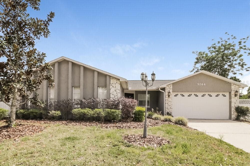 9744 HEATHERWOOD COURT ORLANDO, FL 32825