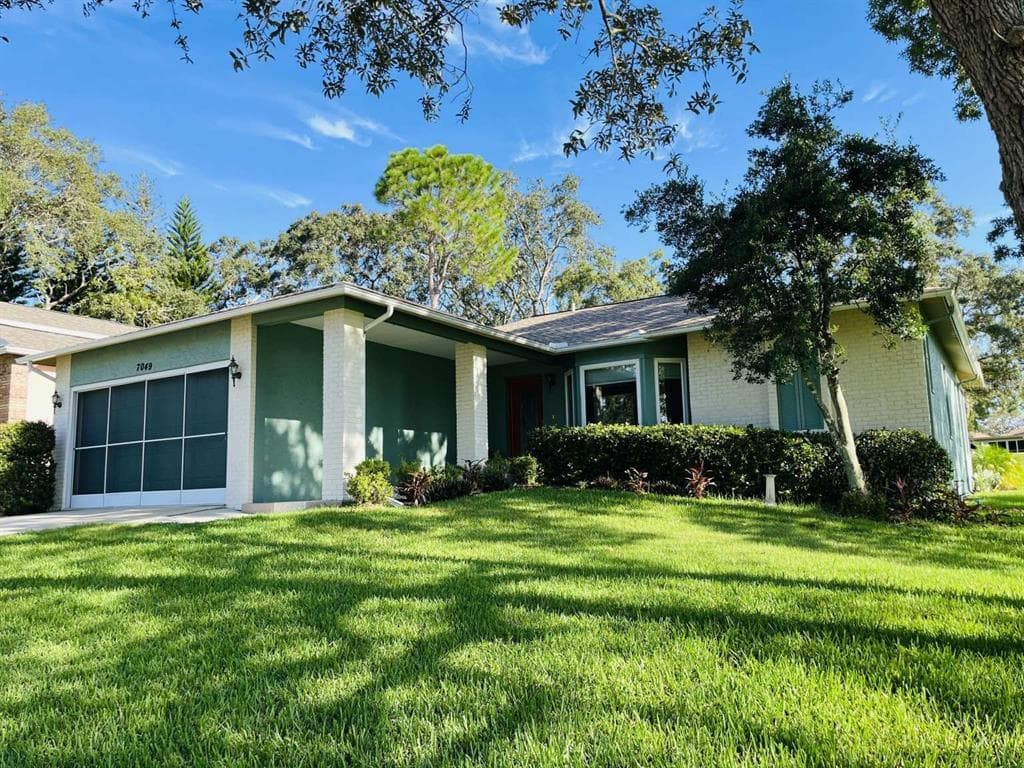 7049 ROLLING GREEN DRIVE SPRING HILL, FL 34606